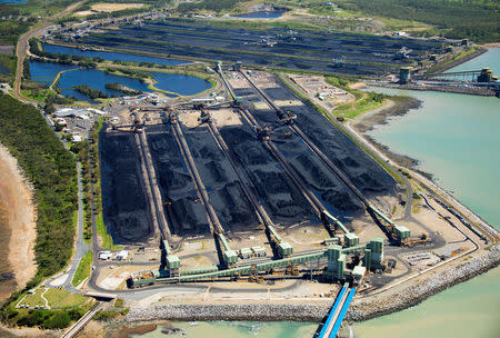 FILE PHOTO: Coal sits at the Hay Point and Dalrymple Bay Coal Terminals that receive coal along the Goonyella rail system, that services coal mines in the Bowen Basin, located south of the Queensland town of Mackay in Australia, April 11, 2017. REUTERS/Daryl Wright/File Photo