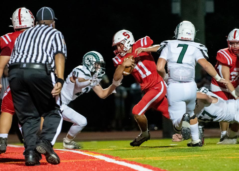 Souderton quarterback Jared Zimmerman runs the ball down the middle for a 4-yard touchdown against Pennridge during a football game at Souderton Area High School in Franconia Township on Friday, September 2, 2022. Big Red defeated the Rams 24-21.