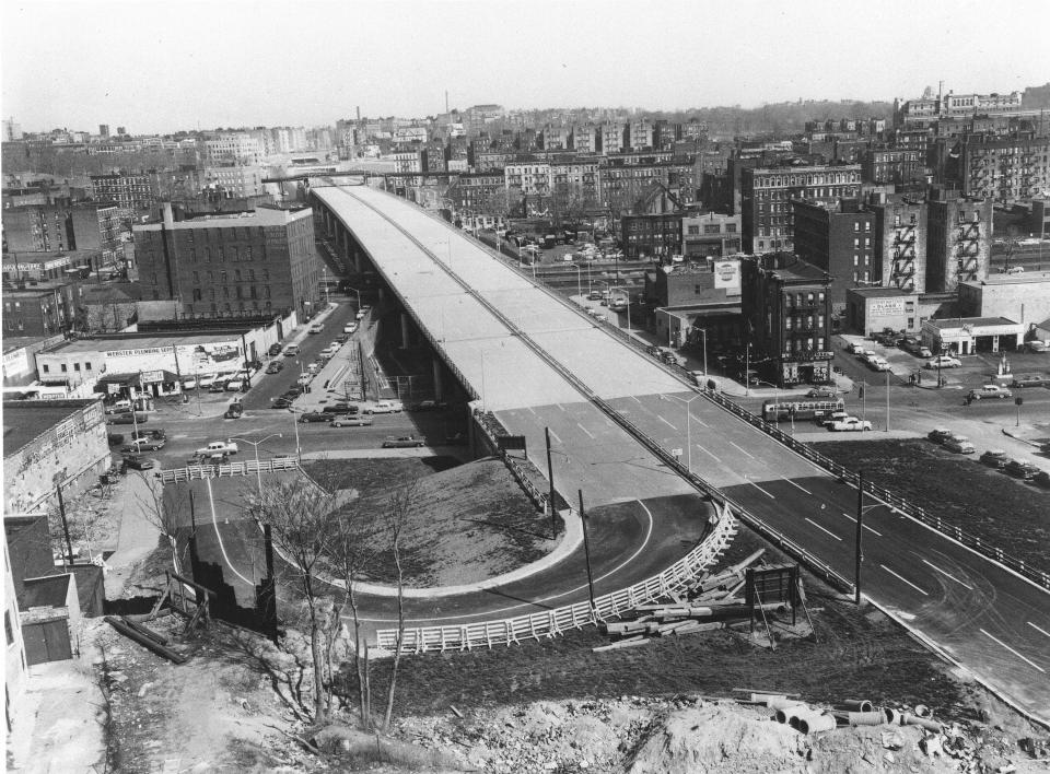 This aerial view shows the Cross Bronx Expressway under construction in New York City in 1960. 
