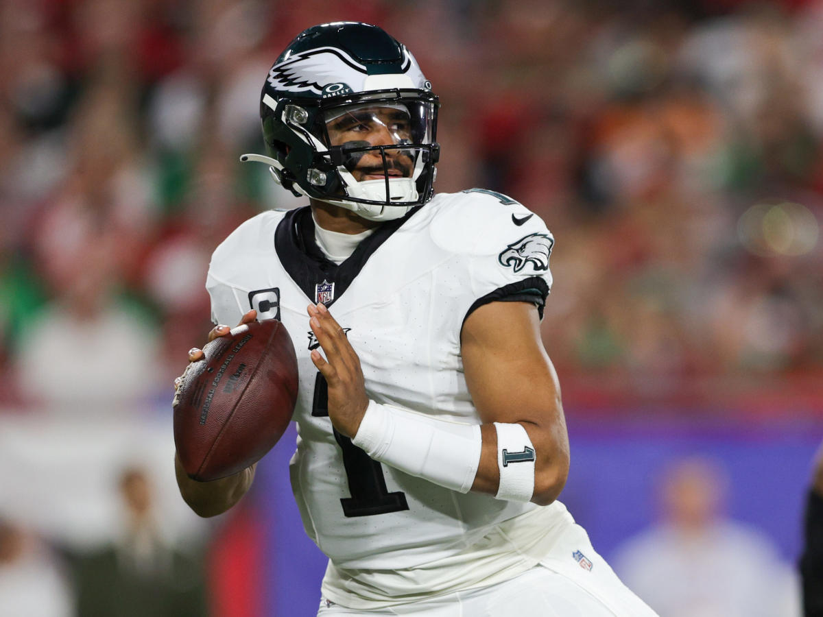 Download Eagles Quarterback Jalen Hurts Throws A Deep Pass