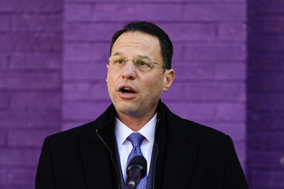 FILE - Pennsylvania Attorney General Josh Shapiro speaks during a news conference in Philadelphia, Dec. 14, 2021. President Joe Biden will appear in Pittsburgh on Friday as the opening step in a broader campaign to promote the White House's achievements in key states ahead of the midterm elections. Lt. Gov. John Fetterman, a leading Senate candidate, and Shapiro, the likely Democratic nominee in the race for governor, will be absent because of scheduling conflicts, according to their respective spokespeople. (AP Photo/Matt Rourke, File)