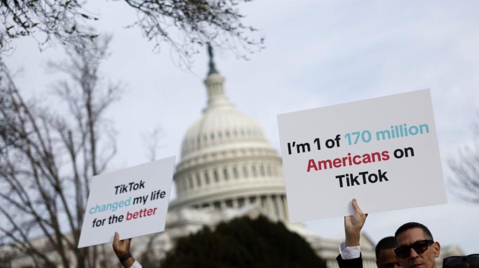 WASHINGTON, DC – MARCH 13: Participants hold signs in support of TikTok outside the U.S. Capitol Building on March 13, 2024 in Washington, DC. The House of Representatives will vote Wednesday on whether to ban TikTok in the United States due to concerns over personal privacy and national security unless the Chinese-owned parent company ByteDance sells the popular video app within the next six months. (Photo by Anna Moneymaker/Getty Images)