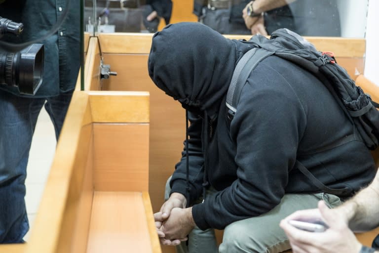 The father of an American-Israeli Jewish teenager accused of making dozens of anti-Semitic bomb threats in the US and elsewhere, sits in the Israeli Justice court