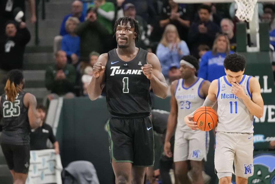 Memphis guard Jayhlon Young (1) reacts after a score during the second half of an NCAA college basketball game against Memphis in New Orleans, Sunday, Jan. 21, 2024. Tulane won 81-79. (AP Photo/Gerald Herbert)