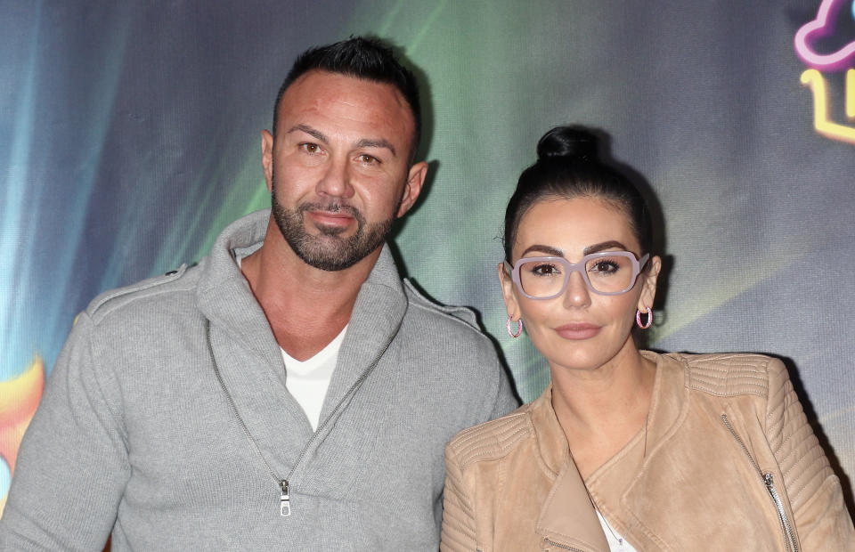 Roger Mathews and Jenni “JWoww” Farley, pictured in November, had a huge blowup Thursday and they are going ahead with their divorce. (Photo: Jim Spellman/Getty Images)