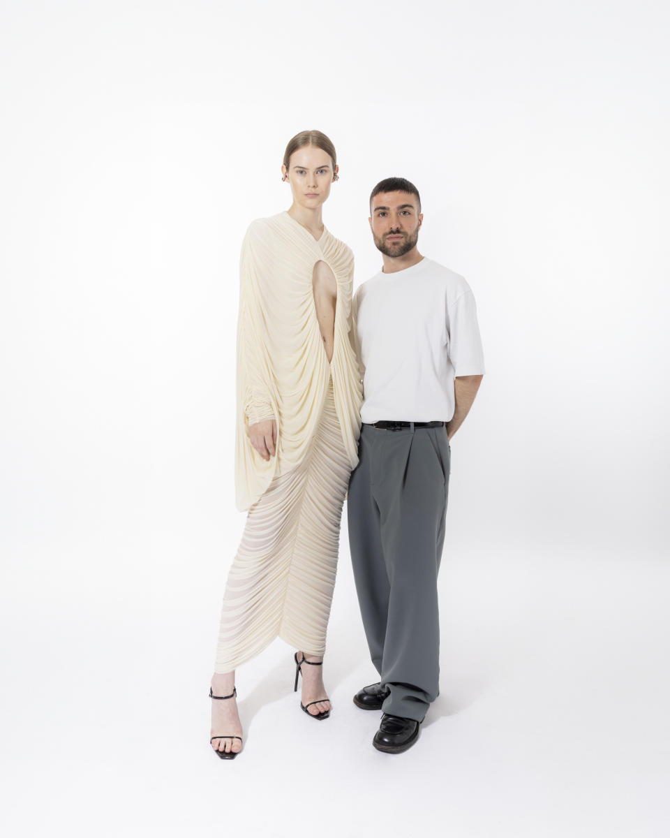 Camera Moda Fashion Trust 2024 Grant recipient Francesco Murano with a model