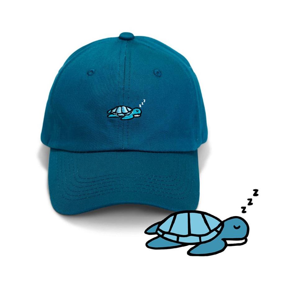 <p><a href="https://followyourlegend.com/products/sea-turtle-legend-hat?variant=39622011584614" rel="nofollow noopener" target="_blank" data-ylk="slk:Shop Now;elm:context_link;itc:0;sec:content-canvas" class="link ">Shop Now</a></p><p>Sea Turtle Hat</p><p>$24.00</p><p>followyourlegend.com</p>