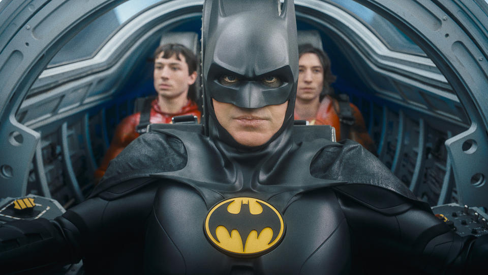 Michael Keaton's Batman flies the two Barrys into battle in the Batwing in The Flash movie