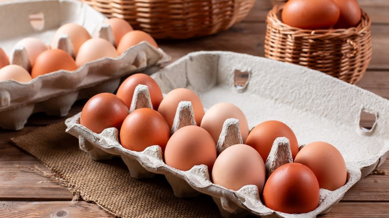 brown eggs in cardboard cartons