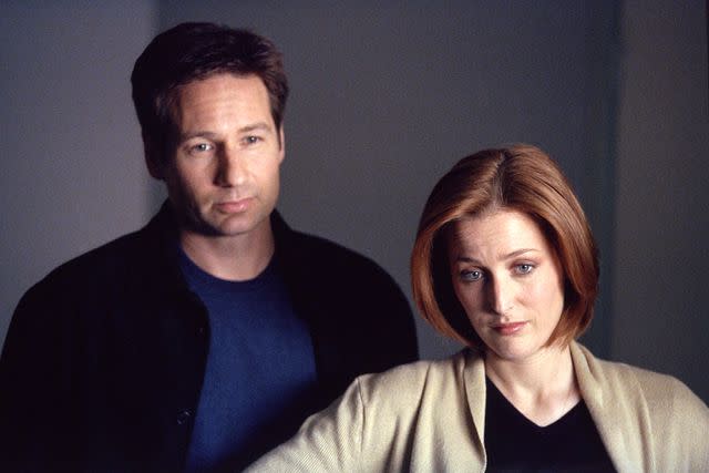 <p>FOX Image Collection via Getty Images</p> David Duchovny and Gillian Anderson in season 8 of 'The X-Files'