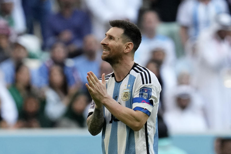 Argentina's Lionel Messi reacts during the World Cup group C soccer match between Argentina and Saudi Arabia at the Lusail Stadium in Lusail, Qatar, Tuesday, Nov. 22, 2022. (AP Photo/Natacha Pisarenko)