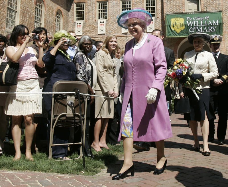 Britain's Queen Elizabeth II walks across the Wren Courtyard at the College of William and Mary in Williamsburg, Va., on May 4, 2007. On February 8, 1693, the College of William and Mary in Williamsburg, Va., was granted a charter by Britain's King William III. File Photo by Susan Walsh/UPI