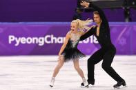 <p>Britain’s Penny Coomes and Britain’s Nicholas Buckland compete in the ice dance short dance of the figure skating event during the Pyeongchang 2018 Winter Olympic Games at the Gangneung Ice Arena in Gangneung on February 19, 2018. / AFP PHOTO / Mladen ANTONOV </p>