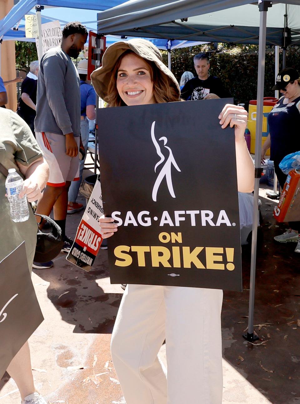 Mandy Moore joins SAG-AFTRA and WGA members as they walk the picket line at The Walt Disney Co. studios on July 14, 2023 in Burbank, California.