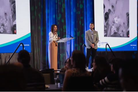 National Vision's Chief Medical Officer Priti Patel, O.D. (Left) Educated and Empowered Members of the National Vision Doctor of Optometry Network Alongside Head of Doctor Network, Alexander Smith, O.D. (Photo: Business Wire)