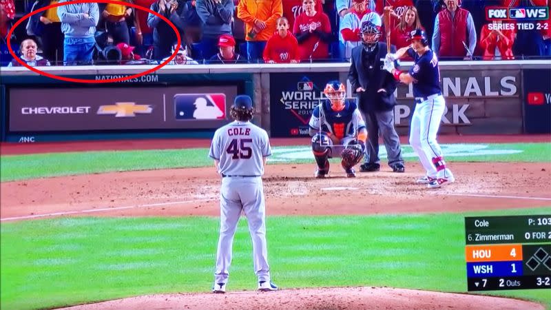 Two of the girls, pictured here flashing Gerrit Cole at the World Series.