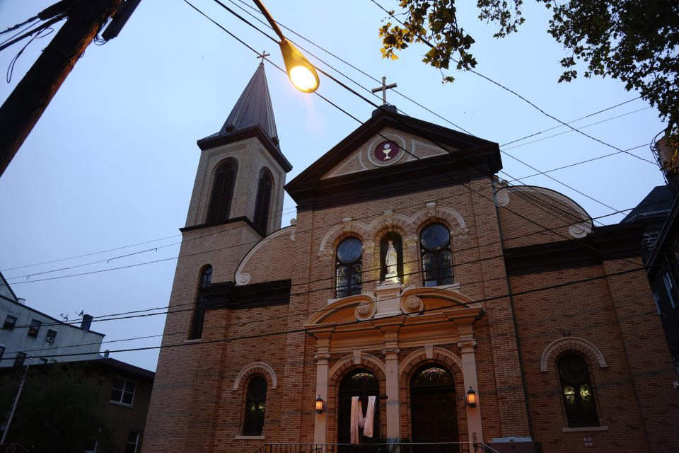 This May 28, 2020 photo shows the Holy Rosary Roman Catholic Church in Jersey City, N.J. Samier Tadros, 46, claims Bishop Nicholas DiMarzio, who was assigned to the church, “repeatedly sexually abused” him starting when he was about 6 years old, according to a March 9, 2020 letter that Tadros' lawyer sent to the Archdiocese of Newark. Tadros has asked for $20 million in compensation. DiMarzio’s lawyer said the accusation is not true and that DiMarzio will never agree to a settlement. (AP Photo/Jessie Wardarski)