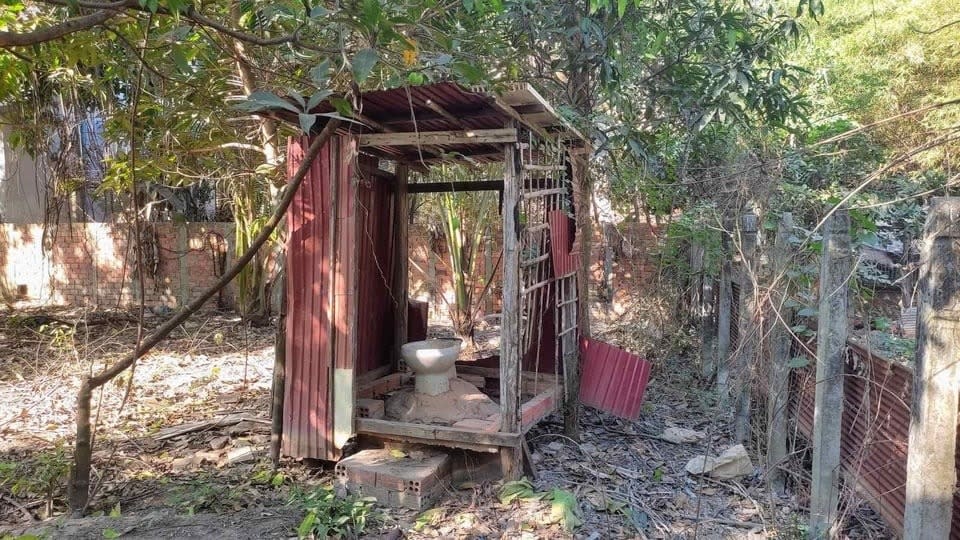 the toilet is exposed because half the walls are down