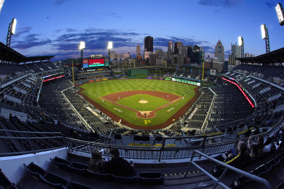 The sun sets during a baseball game between the Pittsburgh Pirates and the San Francisco Giants in Pittsburgh, Thursday, May 13, 2021.(AP Photo/Gene J. Puskar)