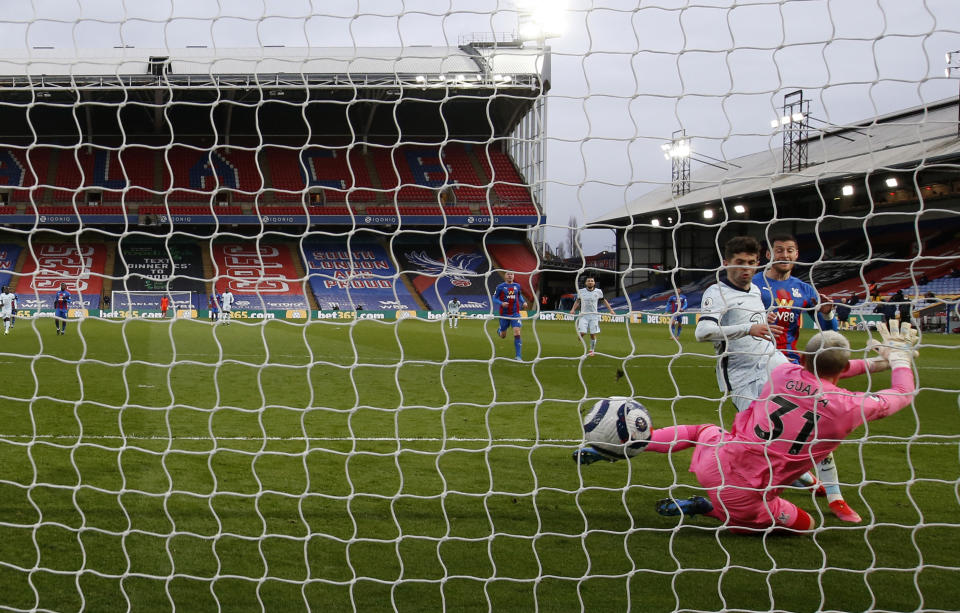 Chelsea's Christian Pulisic scores his side's fourth goal during the English Premier League soccer match between Crystal Palace and Chelsea at Selhurst Park stadium in London, Saturday, April 10, 2021. (Peter Cziborra/Pool via AP)