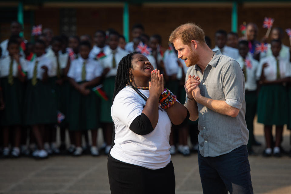 The Duke of Sussex speaks to Angeline Murimirwa, the Executive Director of Africa CAMFED, during his visit to the Nalikule College of Education in Malawi on day seven of the royal tour of Africa.
