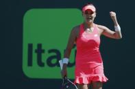 Mar 24, 2018; Key Biscayne, FL, USA; Agnieszka Radwanska of Poland celebrates after match point against Simona Halep of Romania (not pictured) on day five of the Miami Open at Tennis Center at Crandon Park. Radwanska won 3-6, 6-2, 6-3. Mandatory Credit: Geoff Burke-USA TODAY Sports