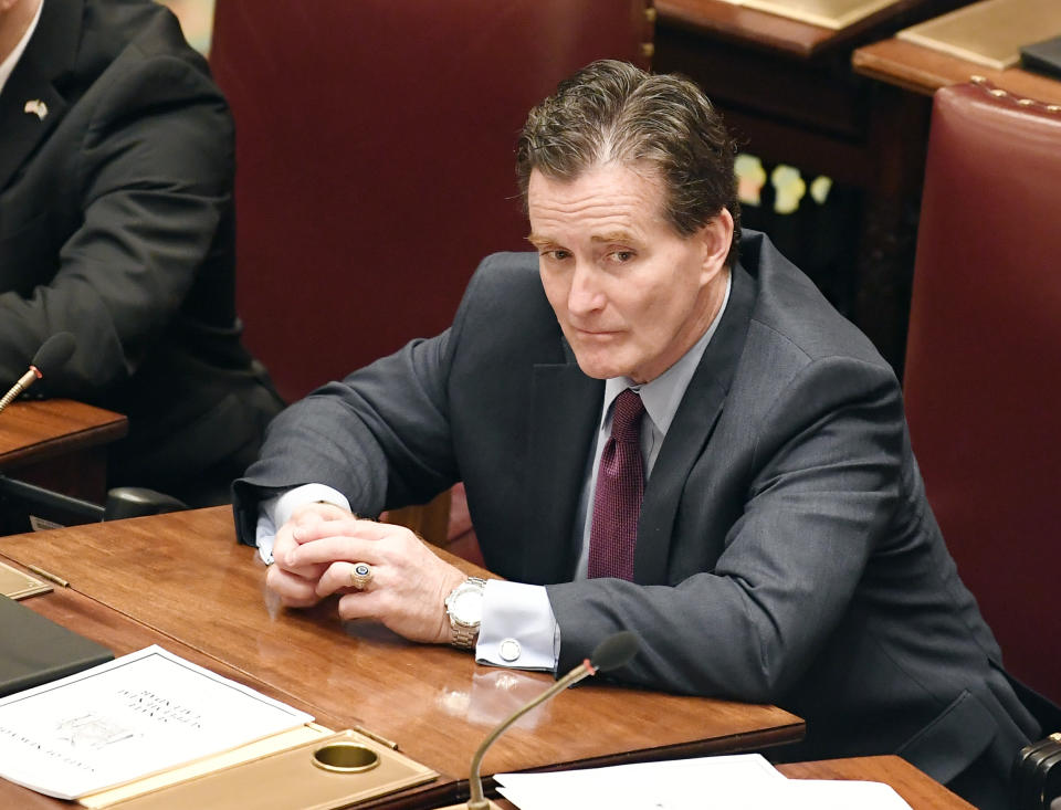 Senate Minority Leader John Flanagan, R-Smithtown, listens as Senate members debate budget bills in the Senate Chamber at the state Capitol Sunday, March, 31, 2019, in Albany, N.Y. (AP Photo/Hans Pennink)