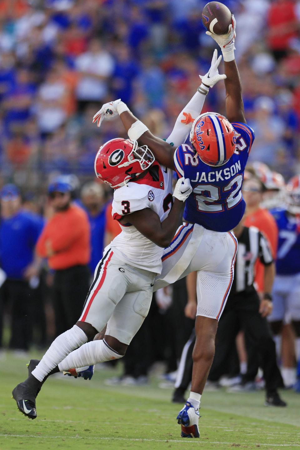 Georgia Bulldogs defensive back Kamari Lassiter (3) breaks up a pass intended for Florida Gators wide receiver Kahleil Jackson (22) during the second quarter of an NCAA Football game Saturday, Oct. 28, 2023 at EverBank Stadium in Jacksonville, Fla. [Corey Perrine/Florida Times-Union]