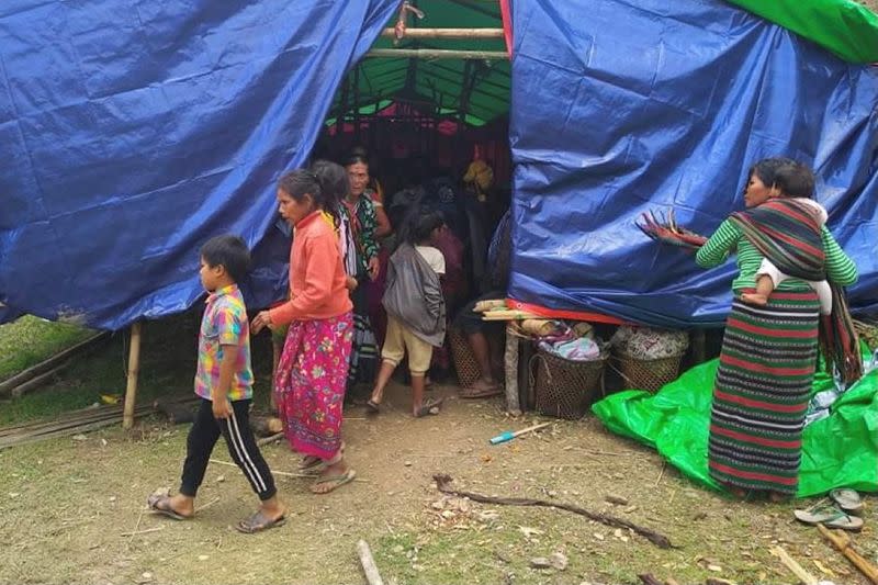 People displaced by fighting in north-western Myanmar between junta forces and anti-junta fighters are seen at a camp in Chin State