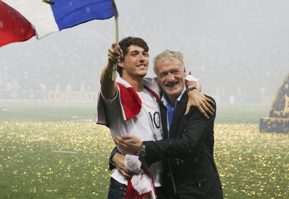 MOSCOW, RUSSIA - JULY 15: Coach of France Didier Deschamps and his son Dylan Deschamps celebrate the victory following the 2018 FIFA World Cup Russia Final between France and Croatia at Luzhniki Stadium on July 15, 2018 in Moscow, Russia. (Photo by Jean Catuffe/Getty Images)