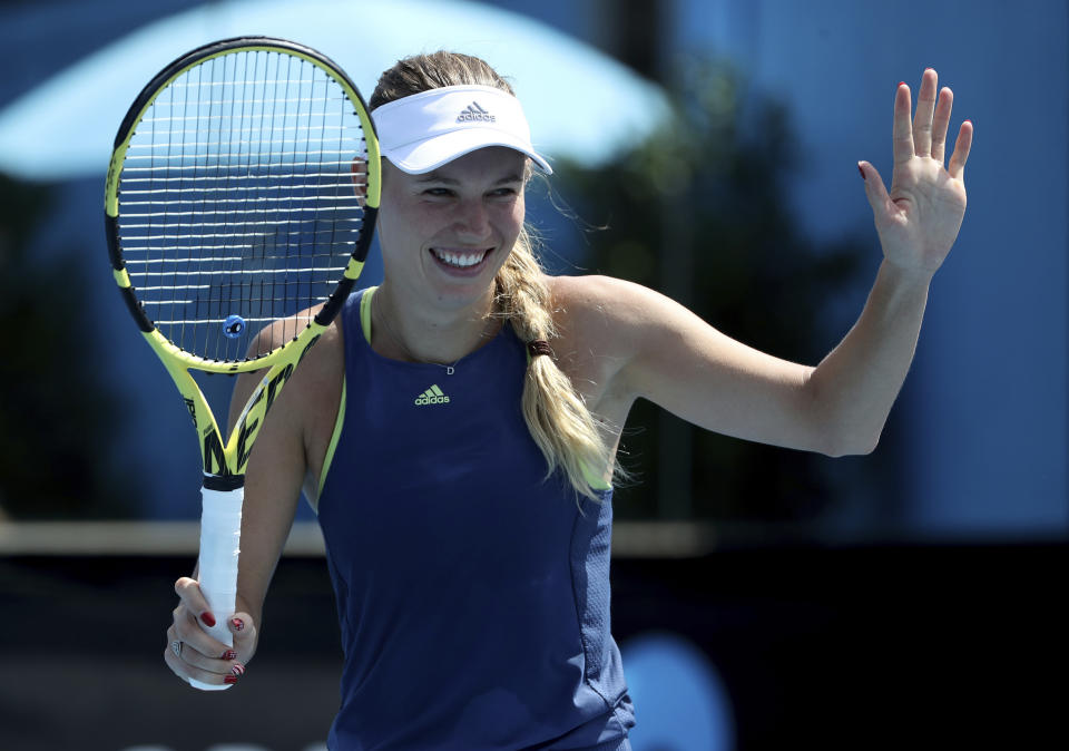 Denmark's Caroline Wozniacki reacts during a practice session ahead of the Australian Open tennis championships in Melbourne, Australia, Saturday, Jan. 12, 2019. (AP Photo/Mark Schiefelbein)