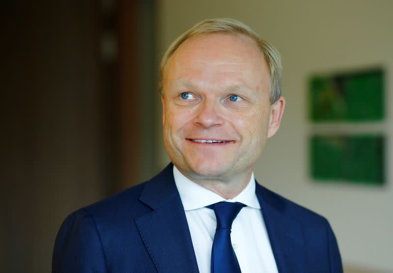 FILE PHOTO: Pekka Lundmark, president and CEO of Finnish state-controlled utility Fortum, poses after a news conference in Duesseldorf