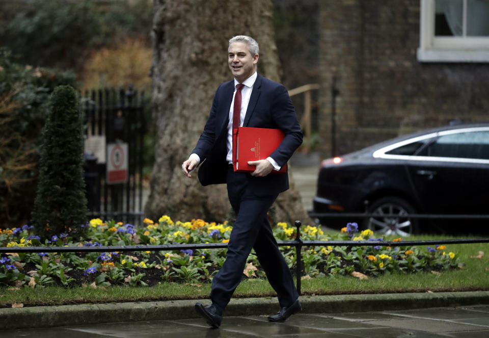 Britain's Brexit Secretary Stephen Barclay arrives at Downing Street. London, Thursday Jan. 17, 2019. British Prime Minister Theresa May is reaching out to opposition parties and other lawmakers Thursday in a battle to put Brexit back on track after surviving a no-confidence vote. (AP Photo/Matt Dunham)