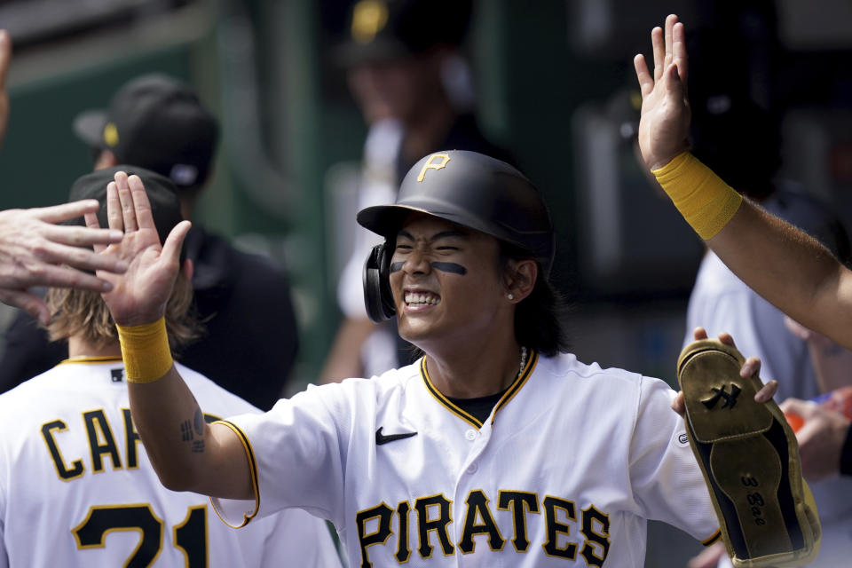 Pittsburgh Pirates' Ji Hwan Bae reacts after scoring on a groundout by Ke'Bryan Hayes against the Chicago Cubs in the first inning of a baseball game in Pittsburgh, Sunday, Aug. 27, 2023. (AP Photo/Matt Freed)