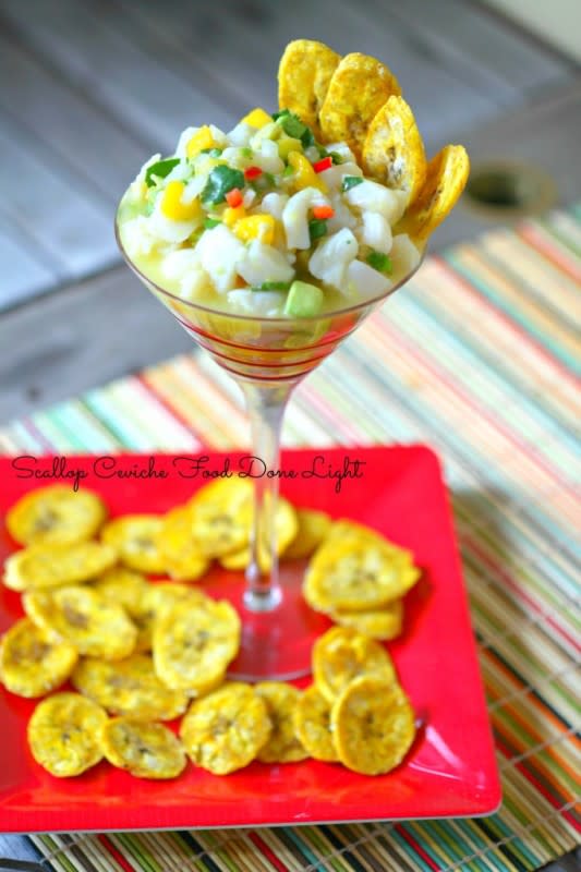 <p>Food Done Light</p><p>Amazing fresh scallop ceviche is served with homemade, baked plantain chips. What an elegant appetizer. <a href="http://fooddonelight.com/scallop-ceviche/" rel="nofollow noopener" target="_blank" data-ylk="slk:Get the recipe HERE;elm:context_link;itc:0;sec:content-canvas" class="link rapid-noclick-resp">Get the recipe HERE</a>. </p>