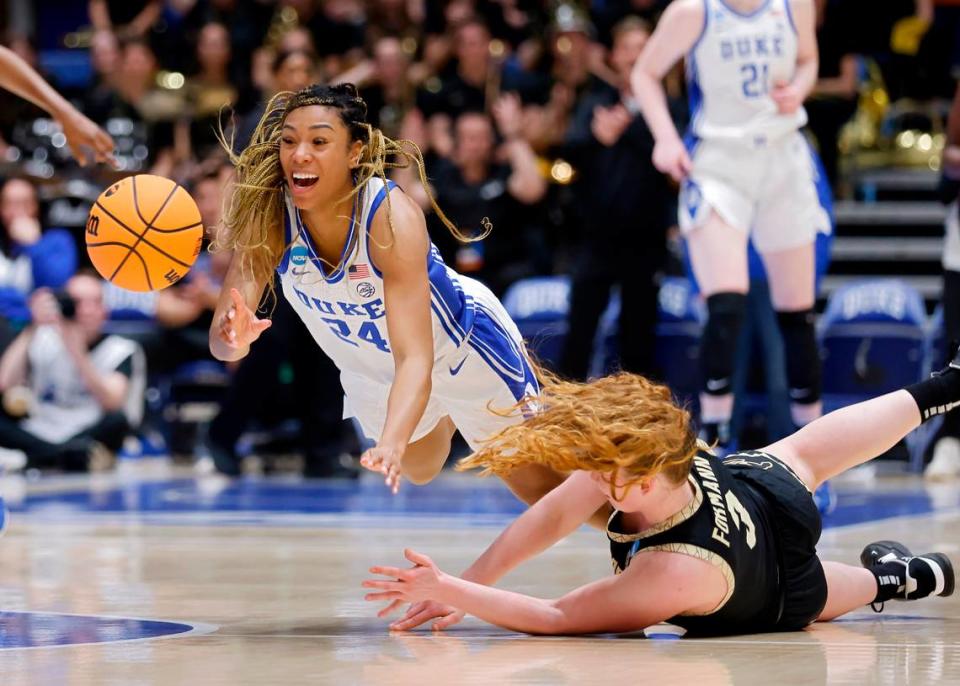 Duke’s Reigan Richardson and Colorado’s Frida Formann dive after a loose ball during the second half of the Blue Devils’ 61-53 loss to Colorado in an NCAA Tournament second round game at Cameron Indoor Stadium on Monday, March 20, 2023, in Durham, N.C.