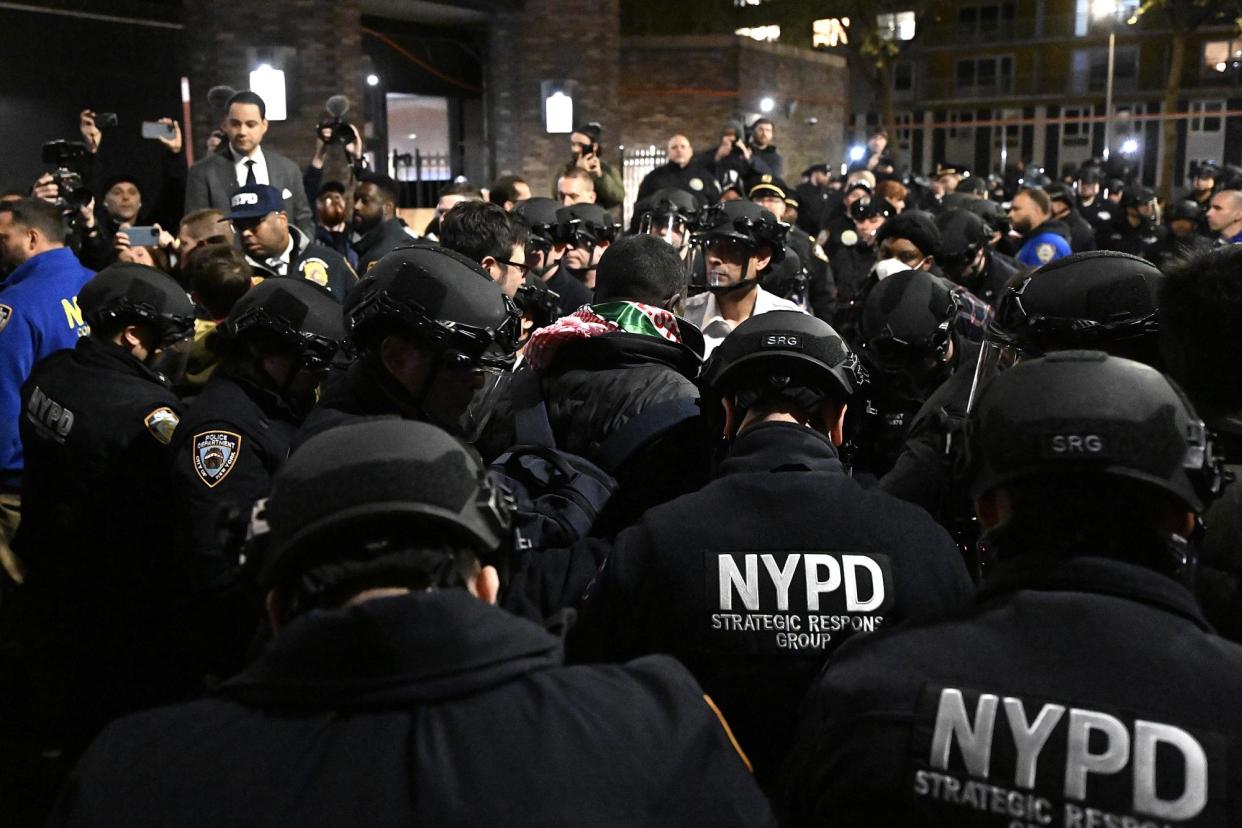 <span>Police intervene and arrest students at New York University (NYU) after they continue their pro-Palestinian protests on campus over the Israel-Gaza war.</span><span>Photograph: Fatih Aktas/Anadolu/Getty Images</span>