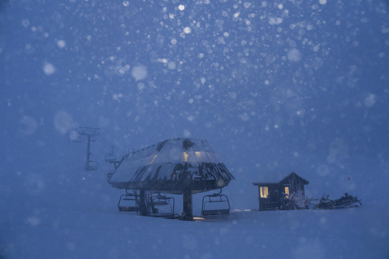 In this image provided by Mammoth Mountain, snow falls at Mammoth Mountain, Friday, Feb. 24, 2023, in Mammoth Lakes, Calif. (Christian Pondella/Mammoth Mountain via AP)