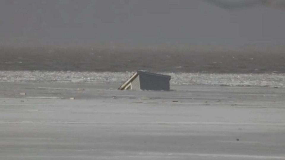 Despite calls from government to remove ice fishing shacks ahead of Thursday's storm, two fell through the ice near Renforth Wharf in Rothesay.
