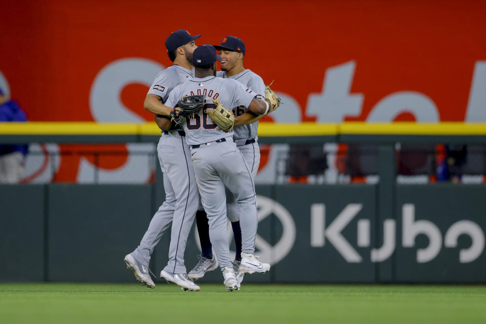 Detroit Tigers outfielders Riley Greene, left, Akil Baddoo, center, and Wenceel Pérez, right, celebrate after winning a baseball game against the Texas Rangers, Monday, June 3, 2024, in Arlington, Texas. (AP Photo/Gareth Patterson)