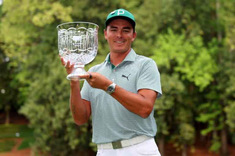 Rickie Fowler holds the Masters Par-3 Contest champion's crystal bowl, a prize no golfer has won at Augusta National in the same year as winning the Masters green jacket (Andrew Redington)