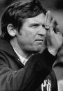 FILE - In this 1976 file photo, Pittsburgh NCAA college football head coach Johnny Majors gestures from the sideline during a college football game in Pittsburgh. Majors, the coach of Pittsburgh’s 1976 national championship team and a former coach and star player at Tennessee, has died. He was 85. Majors died Wednesday morning, June 3, 2020, at home in Knoxville, Tenn., according to a statement from his wife, Mary Lynn Majors.(AP Photo/Harry Cabluck, File)