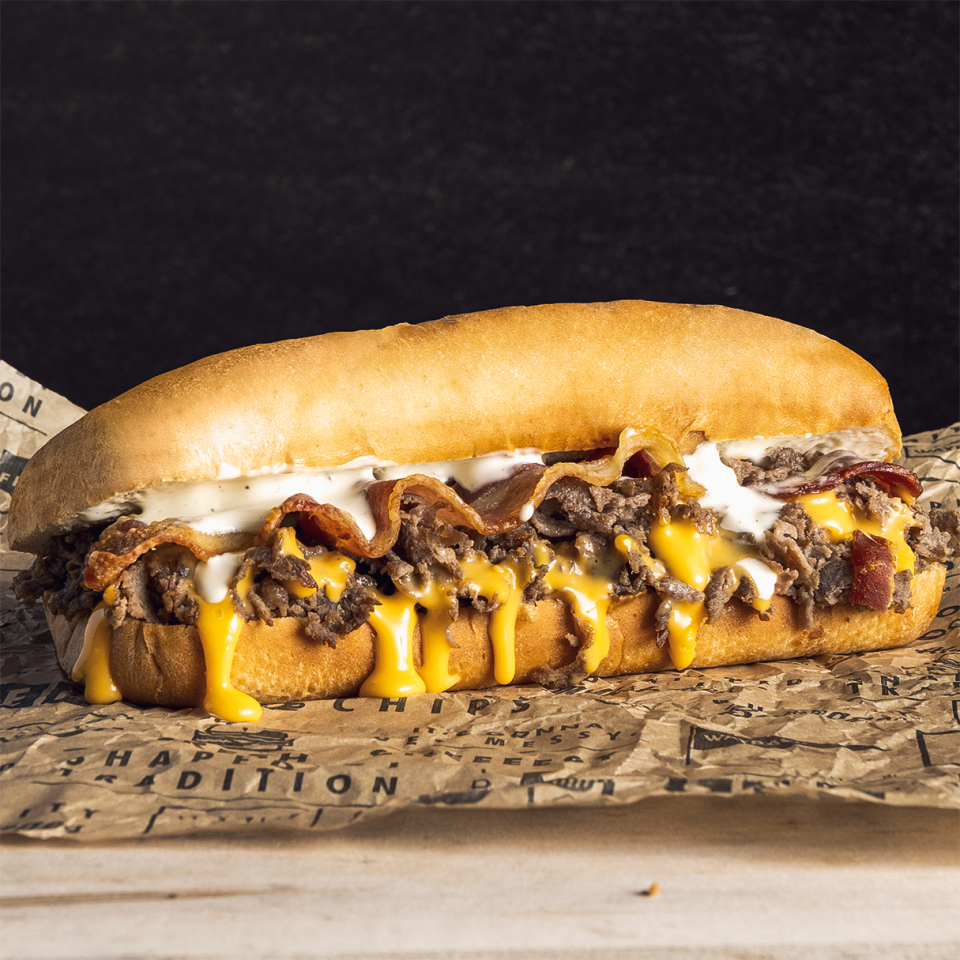 The launch of Wayback Burgers new double-smoked bacon makes possible new menu items like the Cheesy Bacon Ranch Cheesesteak, available for a limited time.