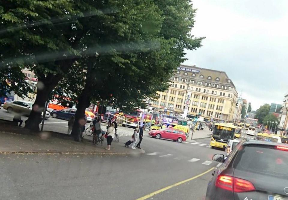 <p>Turku Market Square on Aug. 18, 2017, with a yellow ambulance on the corner of the square (behind red car). Police in Finland say they have shot a man in the leg after he was suspected of stabbing several people in the western city of Turku. (Lehtikuva via AP) </p>