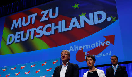 FILE PHOTO: Frauke Petry, chairwoman of the anti-immigration party Alternative for Germany (AfD), and AfD leader Joerg Meuthen sing at the end of the second day of the AfD congress in Stuttgart, Germany, May 1, 2016. REUTERS/Wolfgang Rattay /File Photo