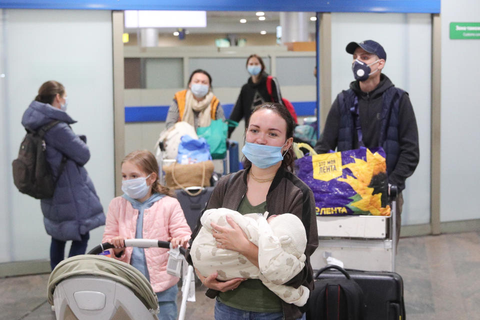 MOSCOW REGION, RUSSIA - APRIL 1, 2020: Russian citizens arriving from New Delhi at Sheremetyevo International Airport. Russia has suspended all international flights from March 27, 2020 due to the COVID-19 infection threat. Airlines are allowed to fly to other countries to evacuate Russian citizens. Sergei Bobylev/TASS (Photo by Sergei Bobylev\TASS via Getty Images)