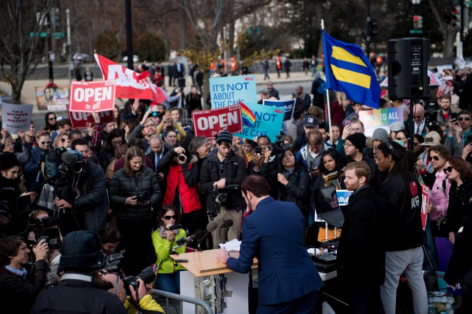 <p>Charlie Craig speaks to supporters outside the US Supreme Court as Masterpiece Cakeshop vs. Colorado Civil Rights Commission is heard on Dec. 5, 2017 in Washington. (Photo: Brendan Smialowski/AFP/Getty Images) </p>