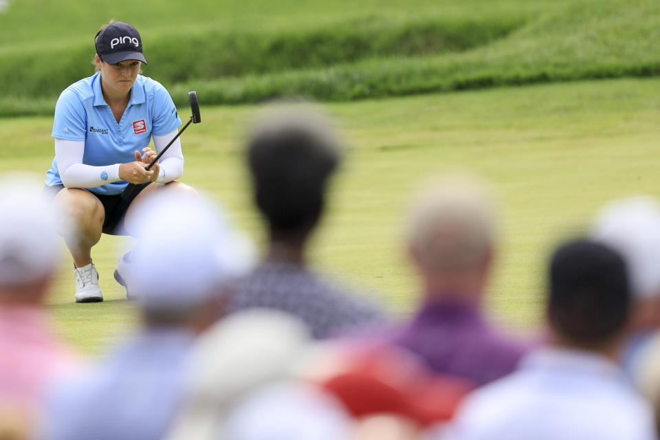 Ally Ewing lines up a putt on the 13th green during the third round of the LPGA Tour Kroger Queen City Championship golf tournament in Cincinnati, Saturday, Sept. 10, 2022. (AP Photo/Aaron Doster)