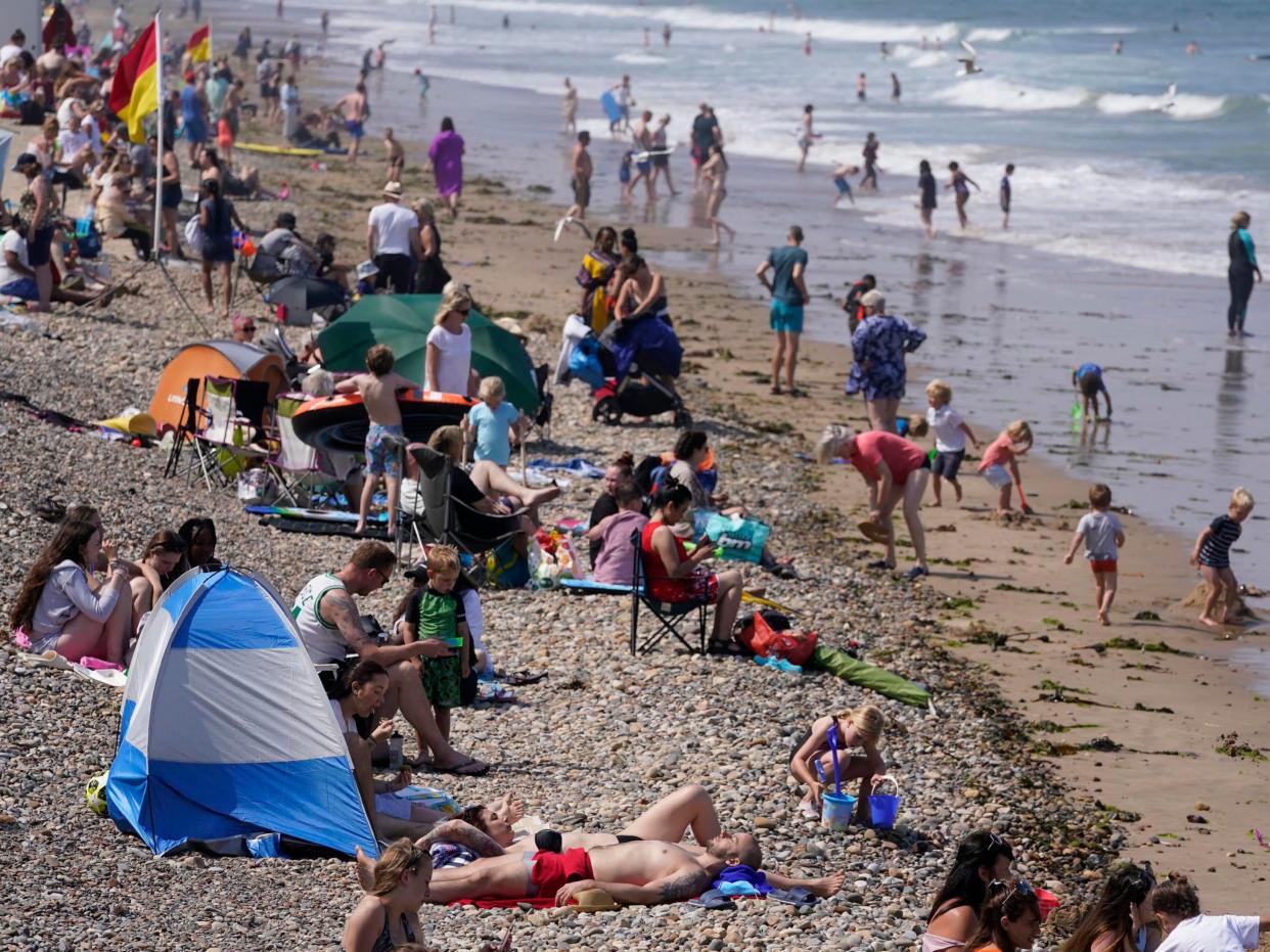 A drier and warmer than average period is forecast from August 14 (PA)