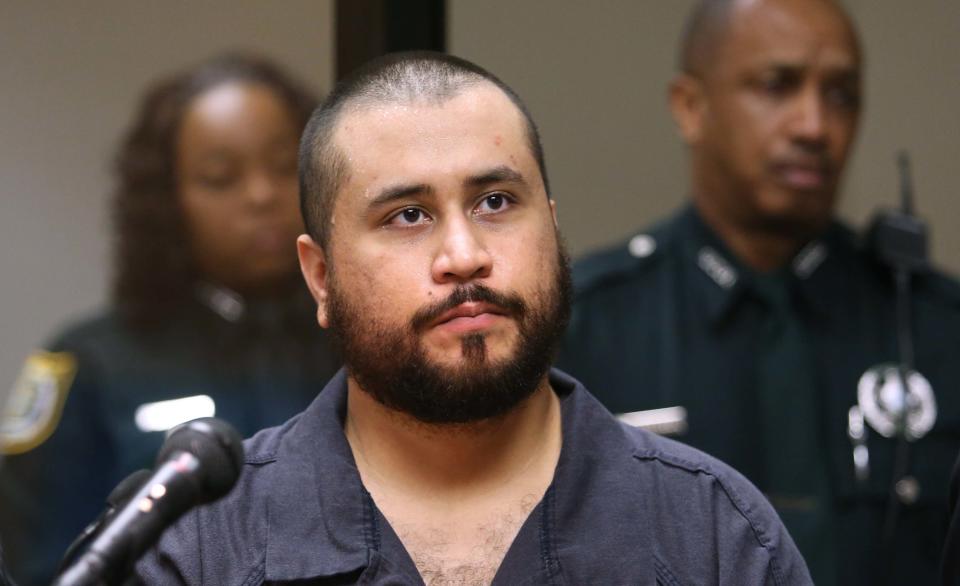 FILE - In this Tuesday, Nov. 19, 2013, file photo, George Zimmerman listens in court, in Sanford, Fla., during his hearing on charges including aggravated assault stemming from a fight with his girlfriend. The Seminole County Sheriff's Office says Zimmerman was arrested in Lake Mary, Friday, Jan. 9, 2015 on an aggravated assault charge, and is being held at the John E. Polk Correctional Facility. (AP Photo/Orlando Sentinel, Joe Burbank, Pool, File)